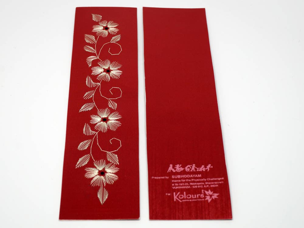 Red bookmark with embroidered flowers