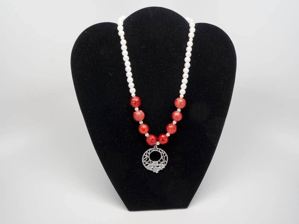 Handmade necklace with red and white pearls and pendant