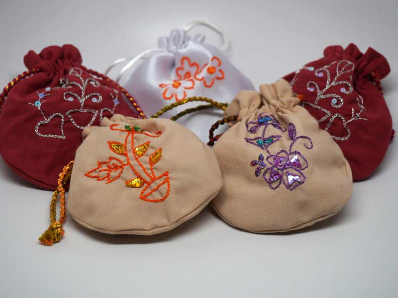 5 assorted pouches with handmade embroidery