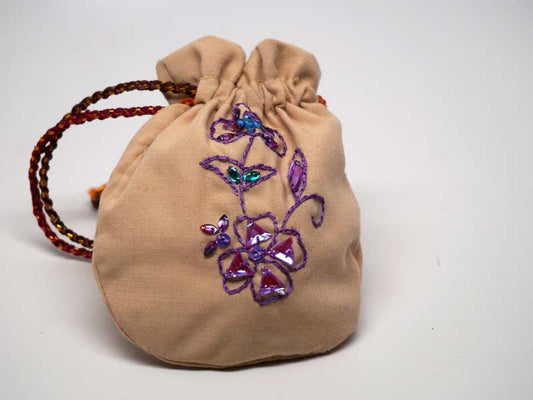 Cipria color pouch with handmade embroidered violet flower