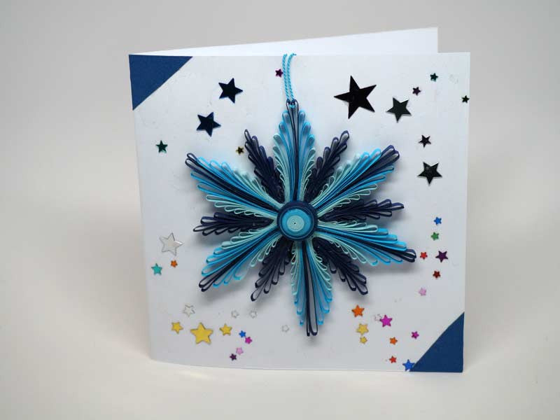 Christmas card with removable decoration