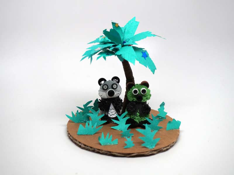 Pandas made with paper filigree