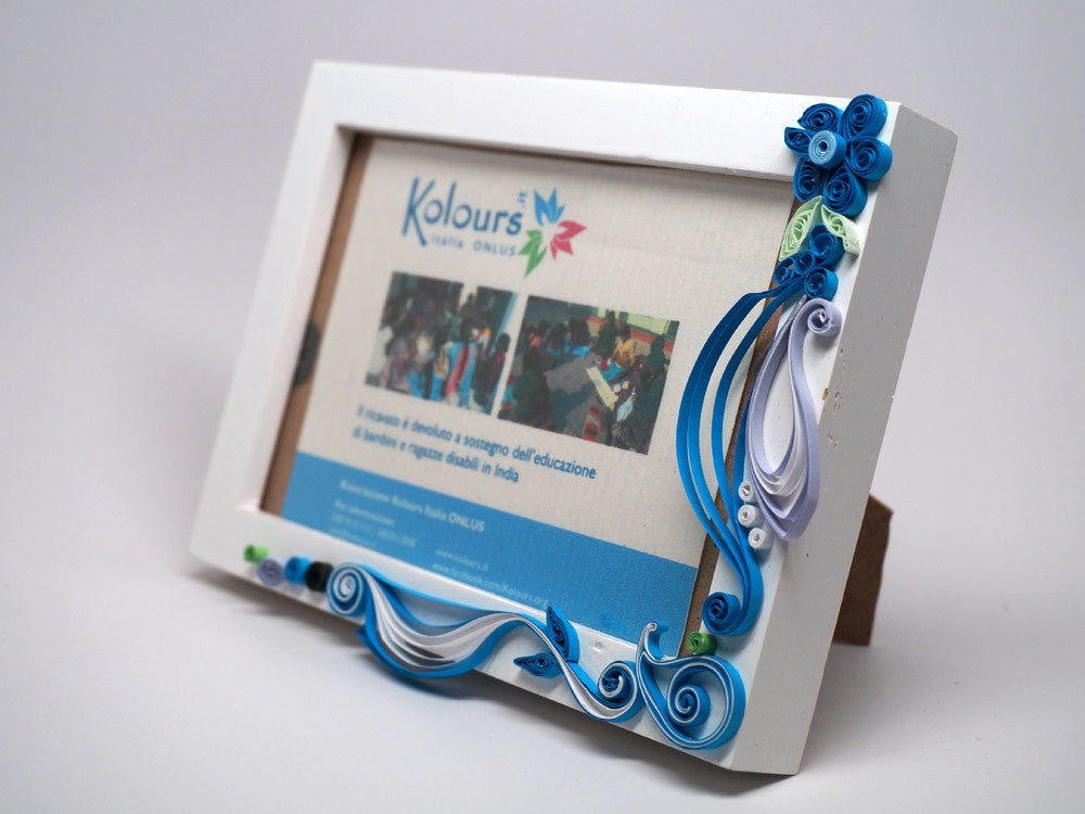 Paper filligree 3D photo frame with handmade blue decorations