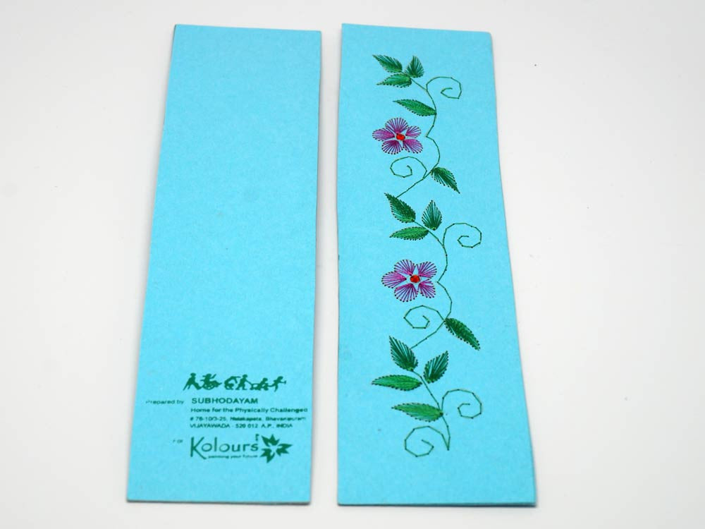 Sky-blue bookmark embroidered by hand