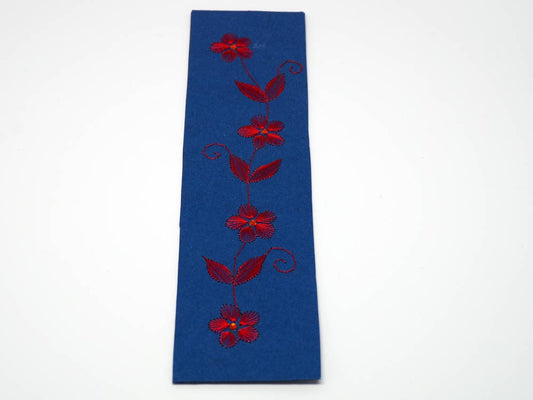 Blue bookmark with embroidered flowers