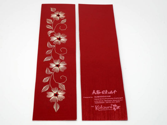 Red bookmark with embroidered flowers
