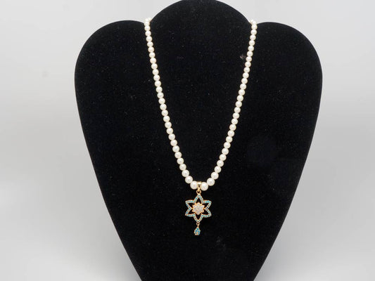Real pearls necklace with azure pendant