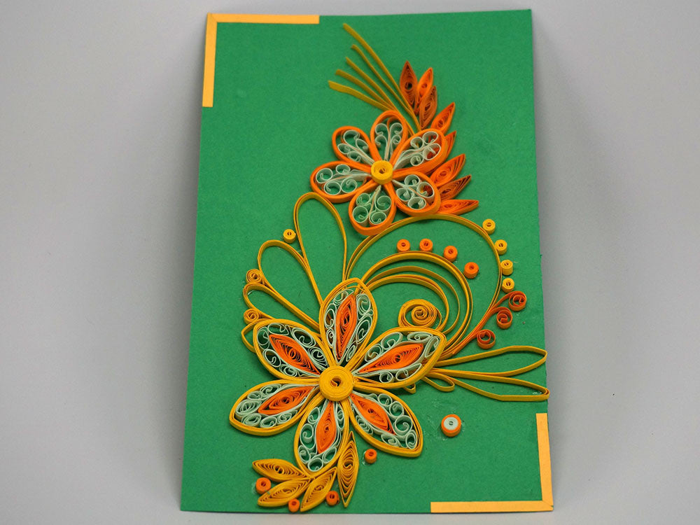 Paper filligree handmade flower decorated green card