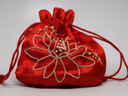 Red pouch with hand embroidered lotus flower