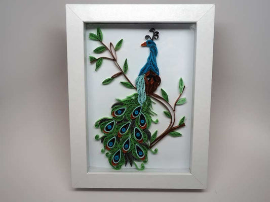 Framed handmade peacock with paper filigree