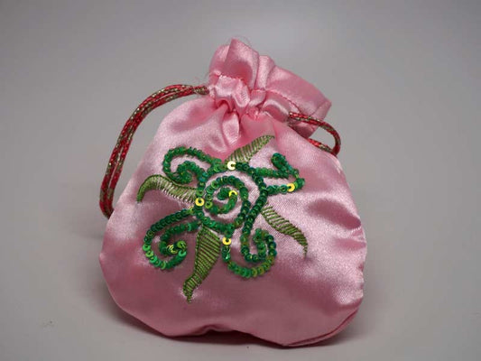 Pink pouch with handmade embroidered sun