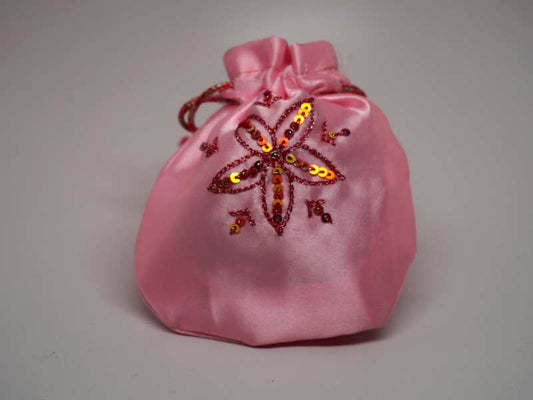 Pink pouch with handmade embroidered star flower