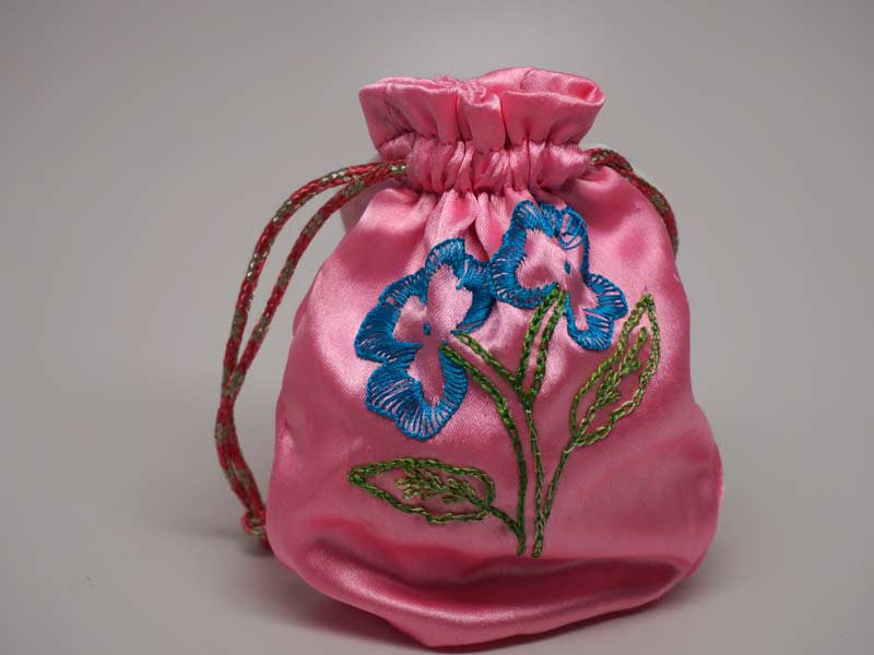 Pink pouch with handmade embroidered flower