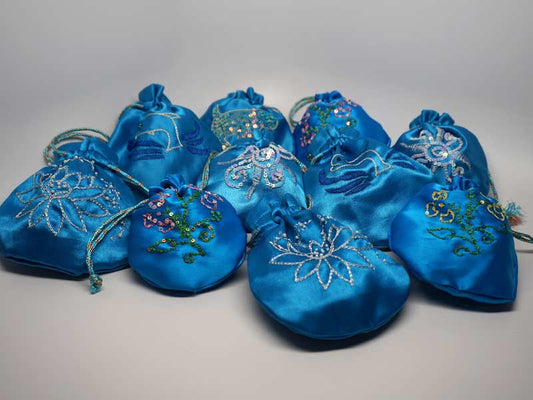 10 assorted blue pouches with handmade embroidery