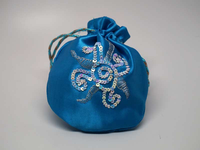 Blue pouch with handmade embroidered sun