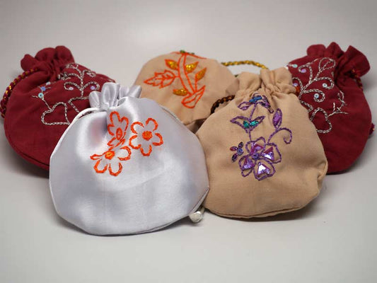 5 assorted pouches with handmade embroidery