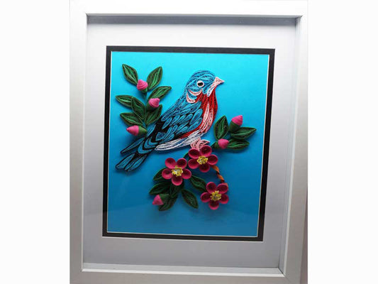 Framed handmade bird with paper filigree