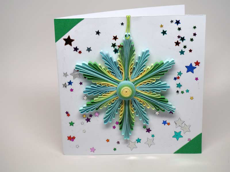 Christmas card with removable decoration