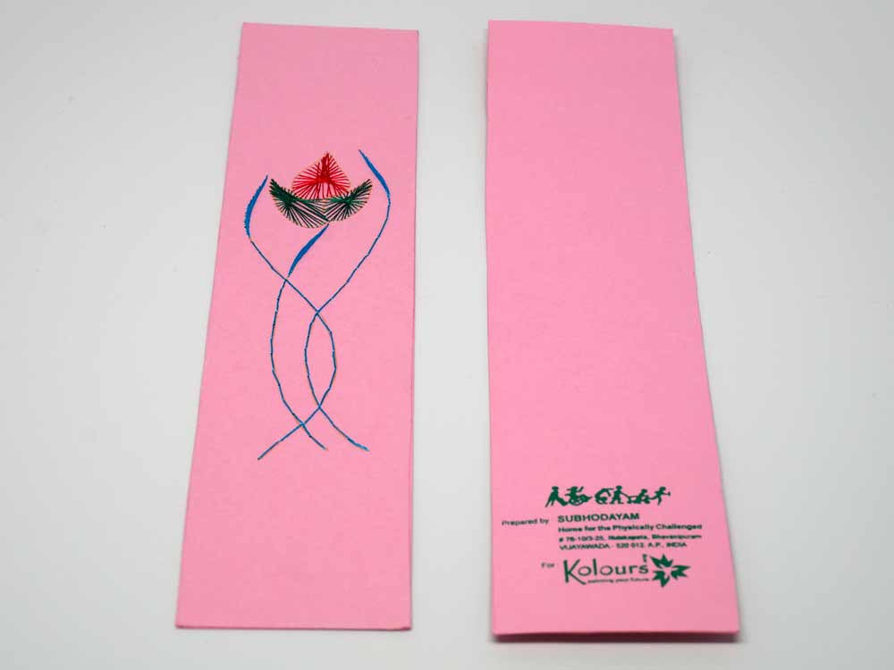 Pink bookmark with embroidered flower